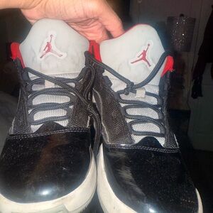 Jordan Kids Black and White Sneakers with Red Accents